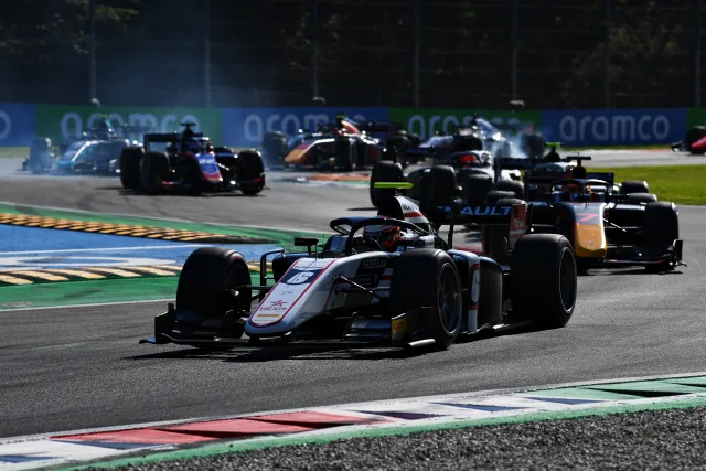 Formula 2 cars racing closely through Monza